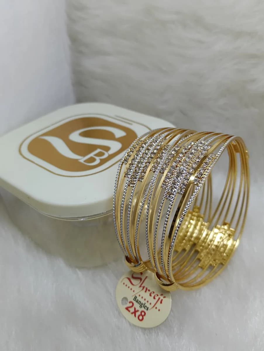 Two-Tone Diamond-Cut Stone Bangles